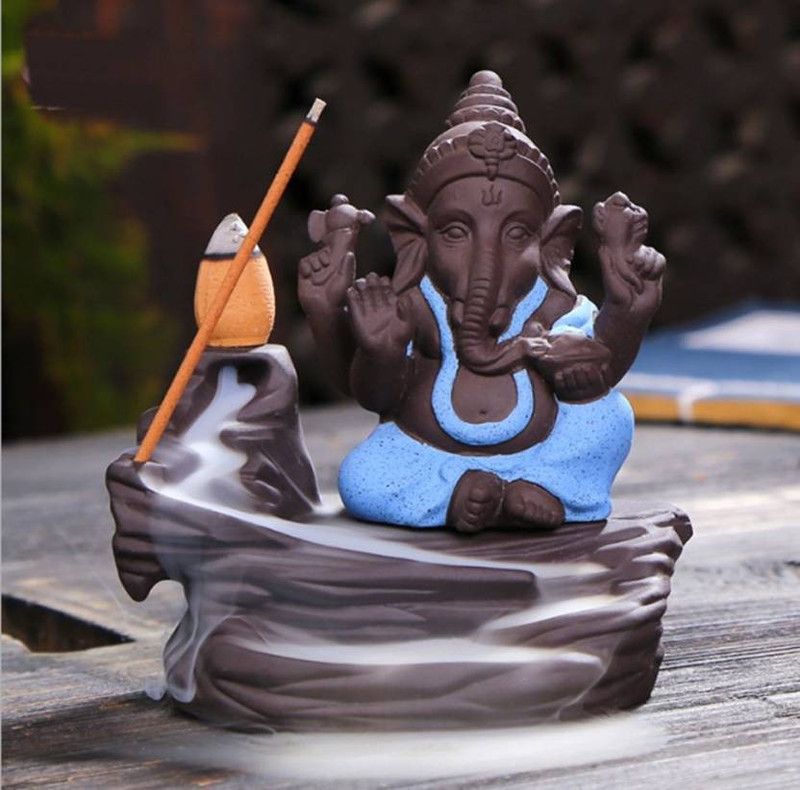 Craftonclick Handcrafted Lord Ganesha Smoke Backflow Cone Incense Holder With 10 Incense Cones Decorative Showpiece - 9.5 cm Decorative Showpiece - 9.5 cm  (Polyresin, Blue)