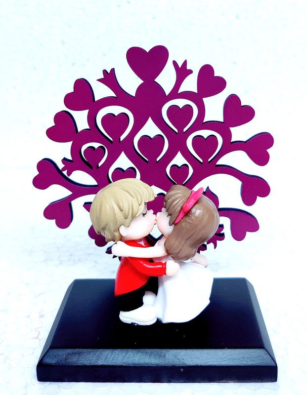 GRACIE COLLECTION LOVE COUPLE STANDING WITH TREE STAND Decorative Showpiece - 12 cm  (Polyresin, Multicolor)