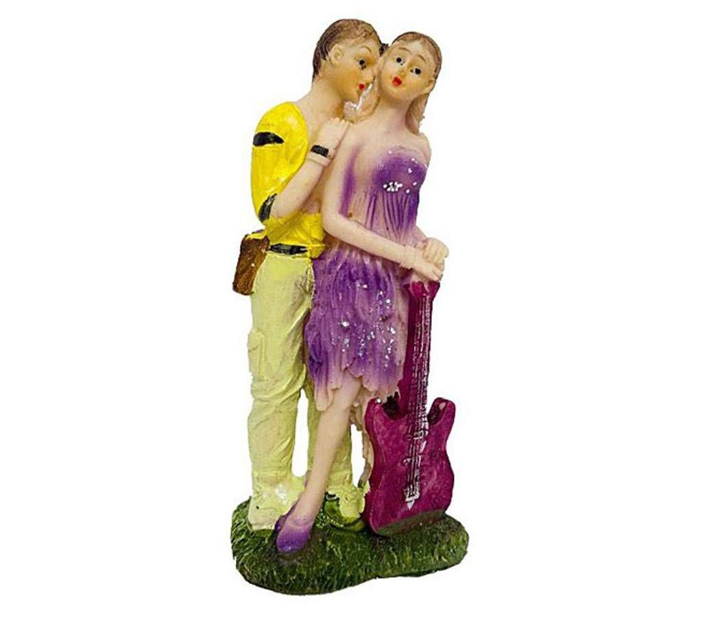 Cute Couple with Guitar - Ceramic showpiece