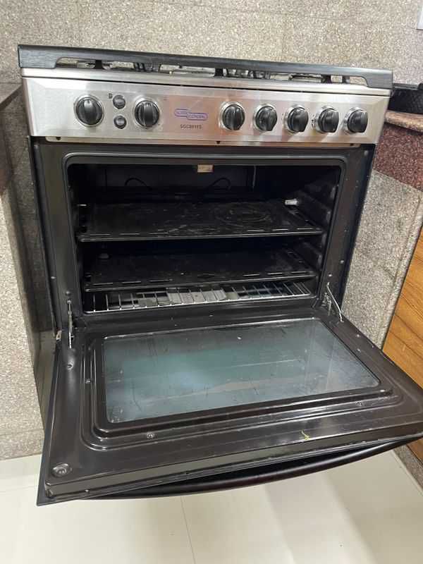Gas stoveburners and electric oven combo.