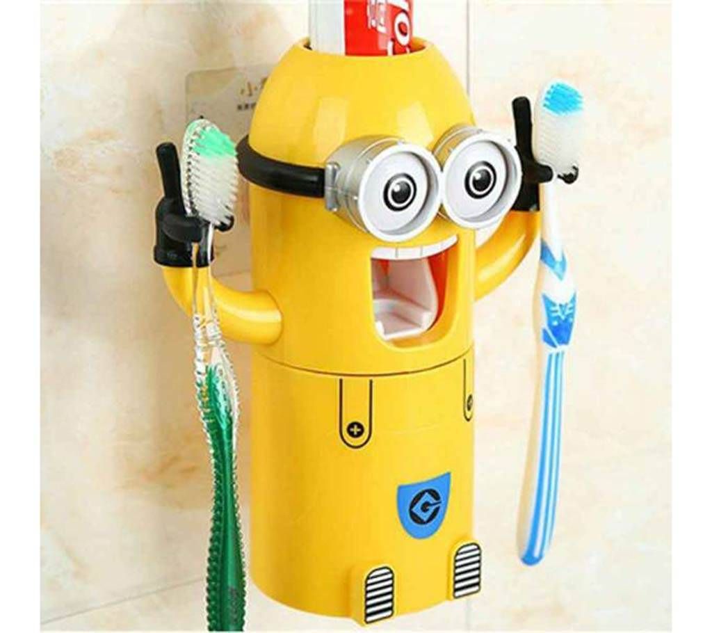 Minion toothpaste dispenser with brush holder