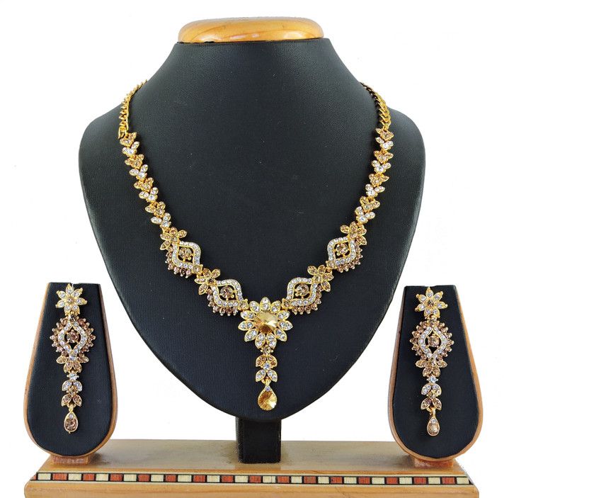 Alloy Gold-plated White, Yellow Jewel Set  (Pack of 1)