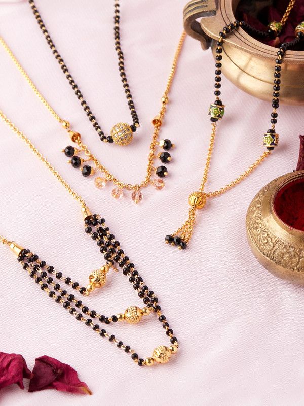 Rubans Gold Plated Set of 4 mangalsutra With Elegant Design and black beads Alloy Mangalsutra
