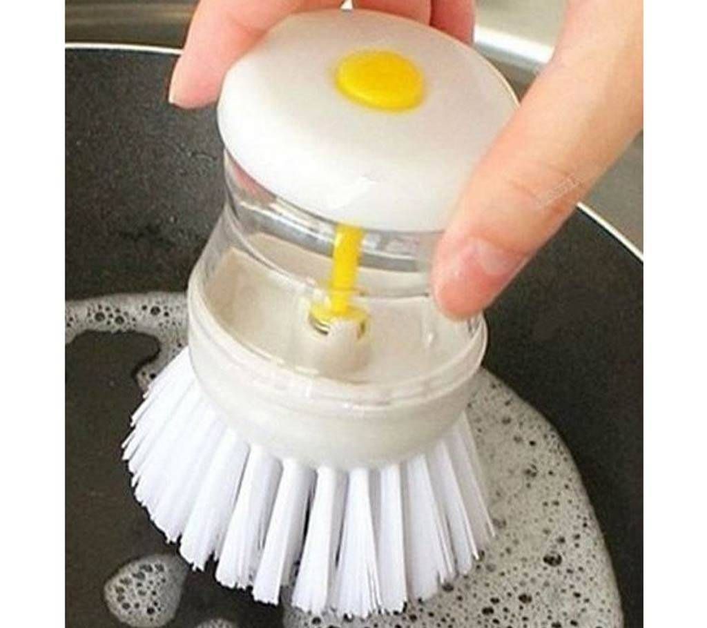 Soap dispensing brush