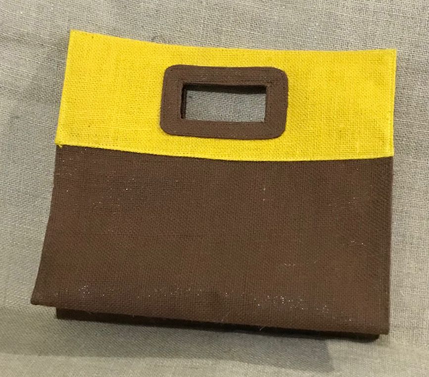 Jutemart offers Beautiful Two(COffee and Yellow) colors inside Laminated fine Jute Fabric of Hand carry bags for lunch, Decorations, Birthday Parties and Wedding