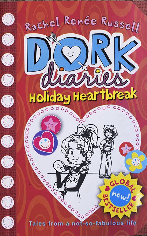 Dork Diaries: Holiday Heartbreak Paperback –  White Paper Print