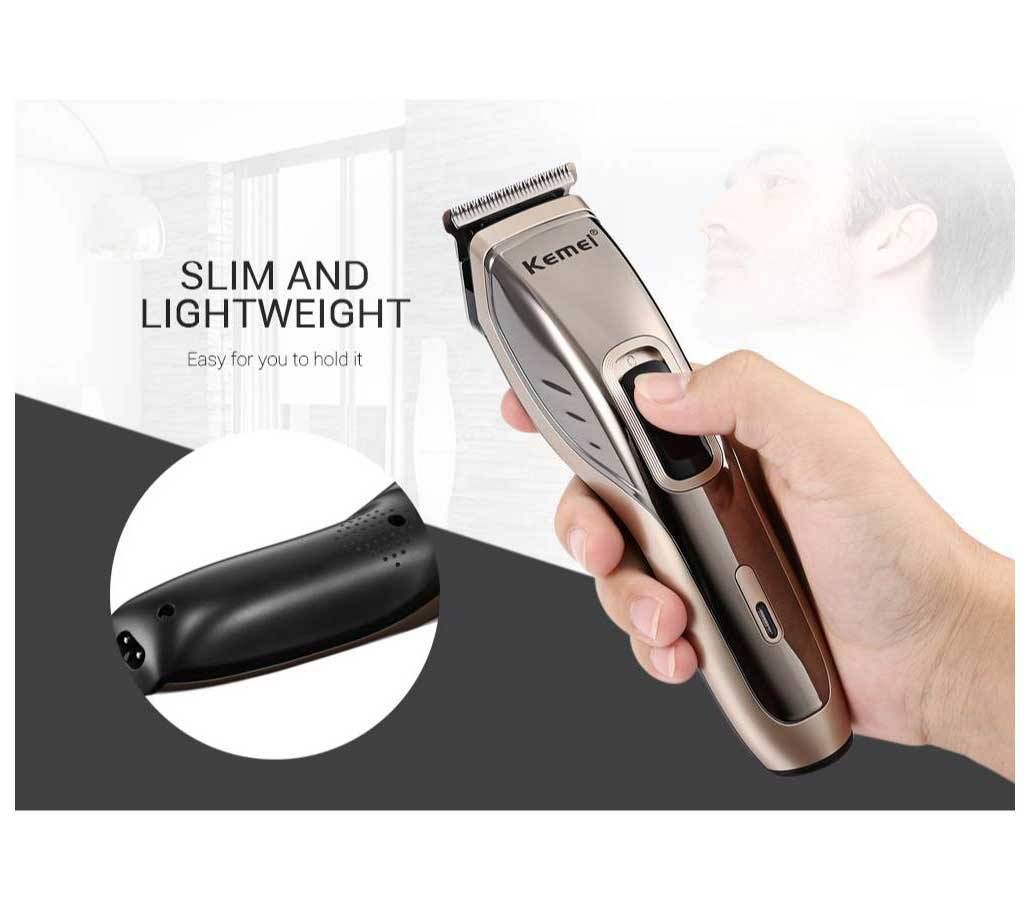 Kemei KM - 5035 Adjustable Cordless Rechargeable Hair Clipper with 4 Guide Comb
