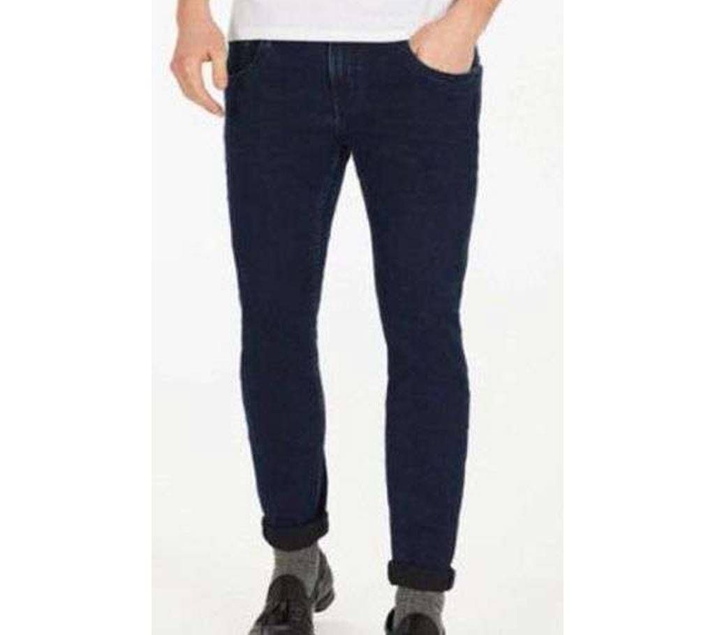 Slim-fit jeans with whiskering and fading on legs.