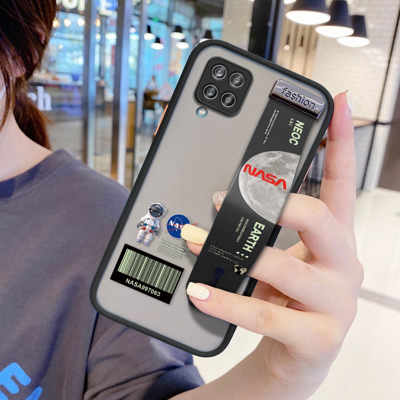 UCUC for Samsung Galaxy A12 Wrist Strap Case Creative Cartoon Astronaut Wristband Printing Cover Shockproof Frosted Phone Case