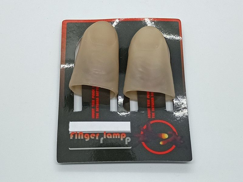 A SARKAR MAGIC SHOP LIGHTING THUMB TIP MAGIC DARK SKIN TONE (RED 2X BRIGHT LIGHT) 1 Magic Tricks  (Age: 8 YEARS & UP)