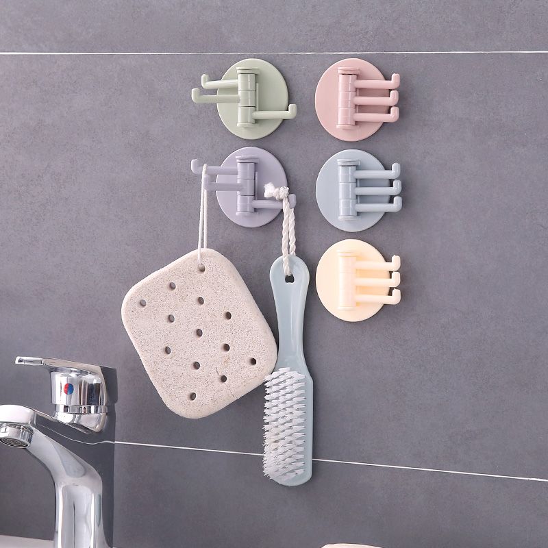 2 Multifunctional bathroom wall shelf free punching seamless trace rack rotating hook strong 3 branch rotating sticky hook