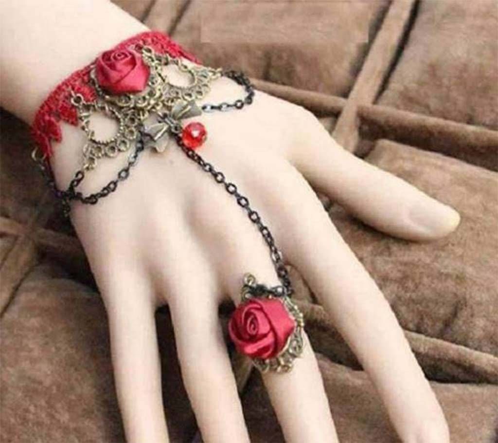 Red flower setting bracelet with finger ring