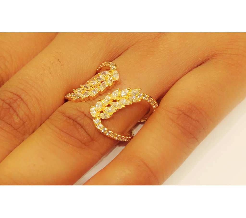 Rose gold colored diamond cut adjustable finger ring