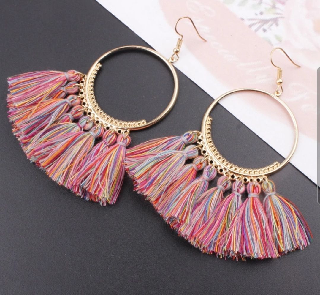 Mixed design tassel earring
