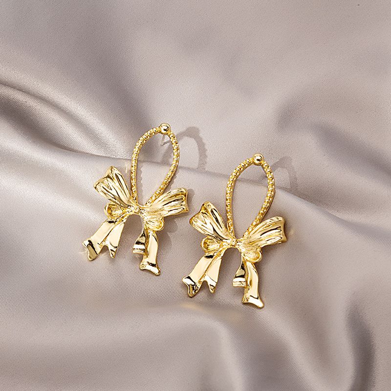 Needle Water Drop Metal Liquid Bow Earrings Personality Metal Temperament Stud Earrings Women's Jewelry for gilrs for women low price