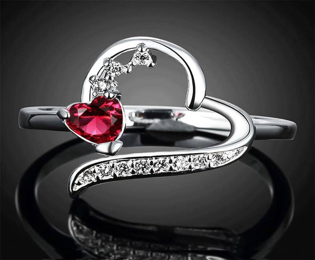 Red shaped red stone setting finger ring 