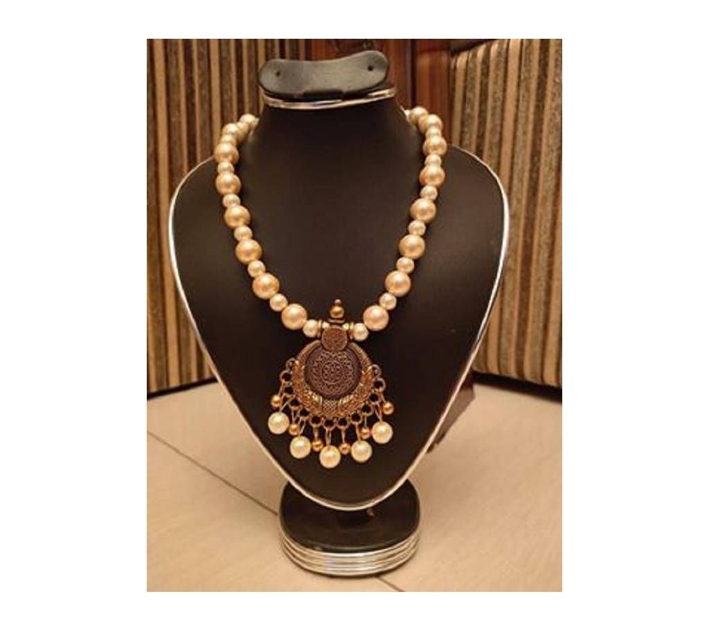 LADIES ORNAMENT