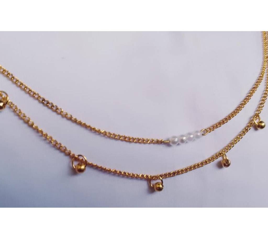 chain golden and white pearl and anklet 