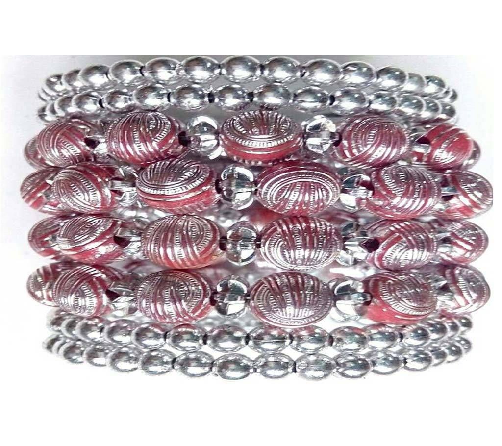 designing red ball silver color bangles 