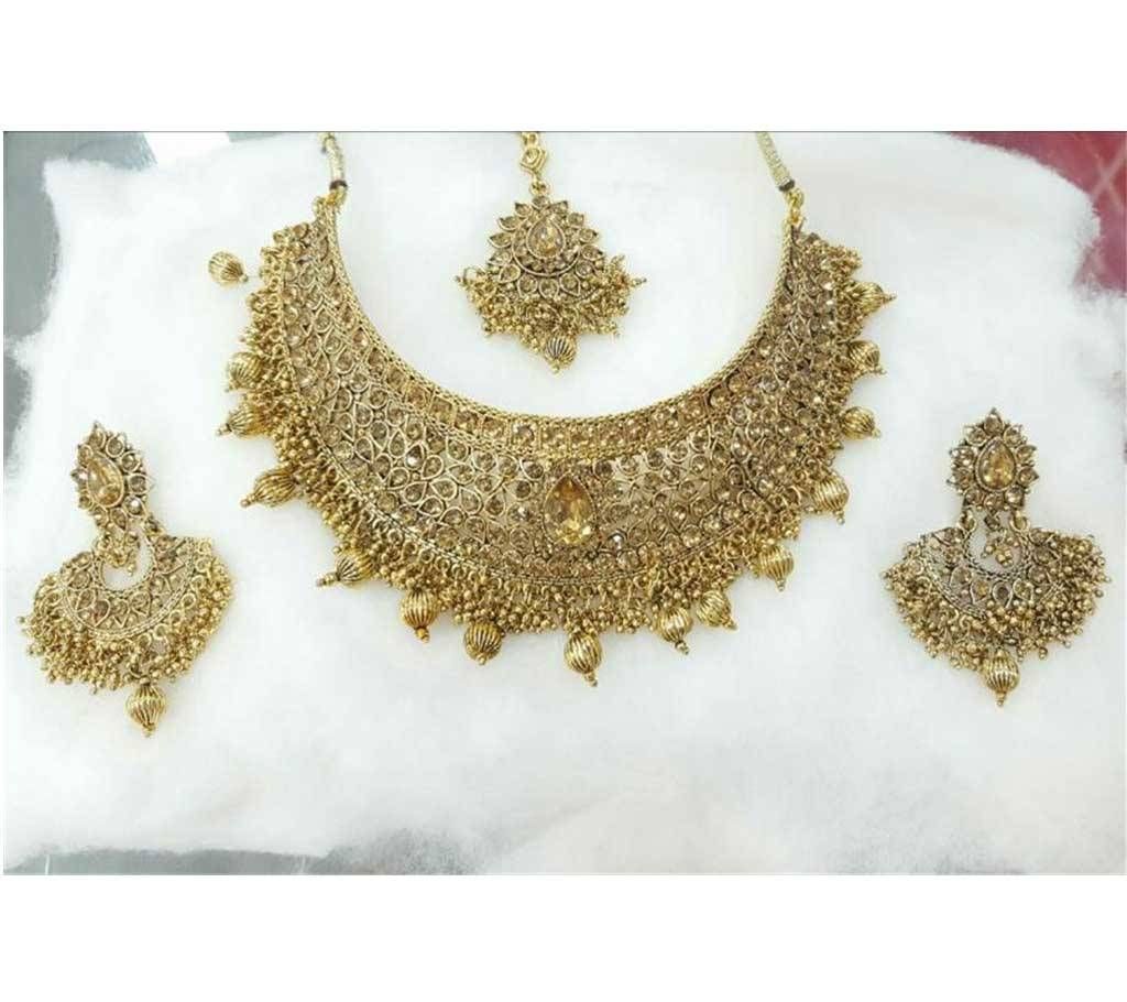 Indian stone setting necklace with tikli 