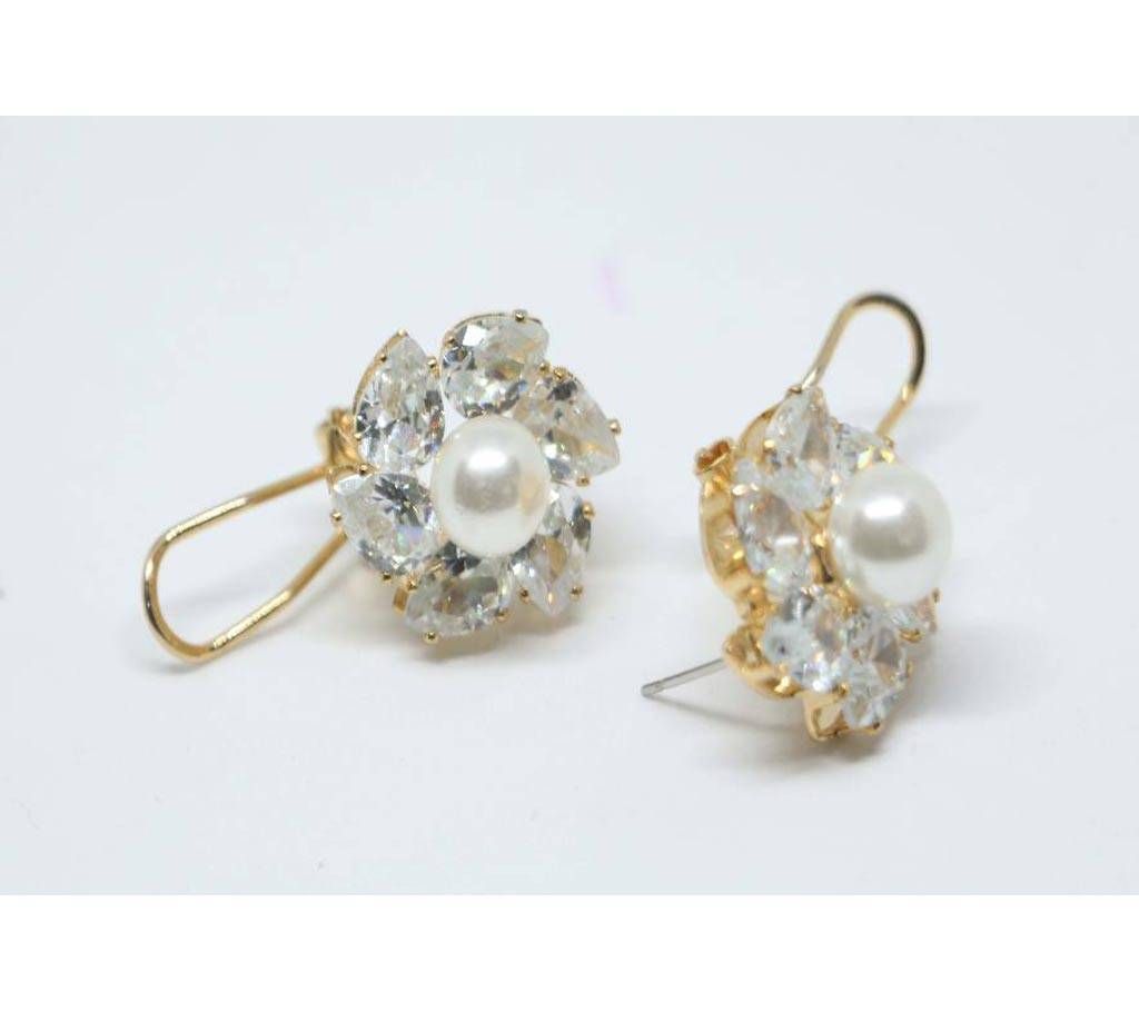 Golden color top with white stone and pearl Earring