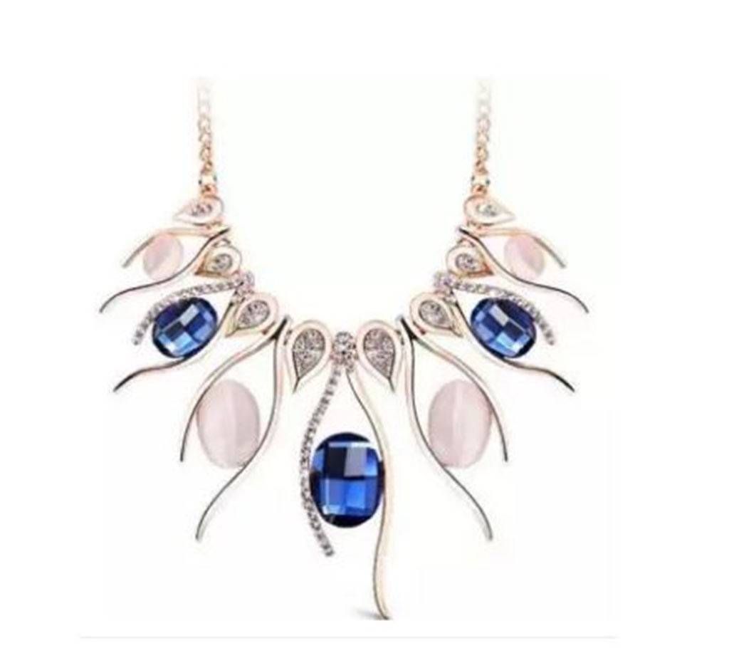 Gold Rose Dancing Wave Necklace with Blue and white stone.