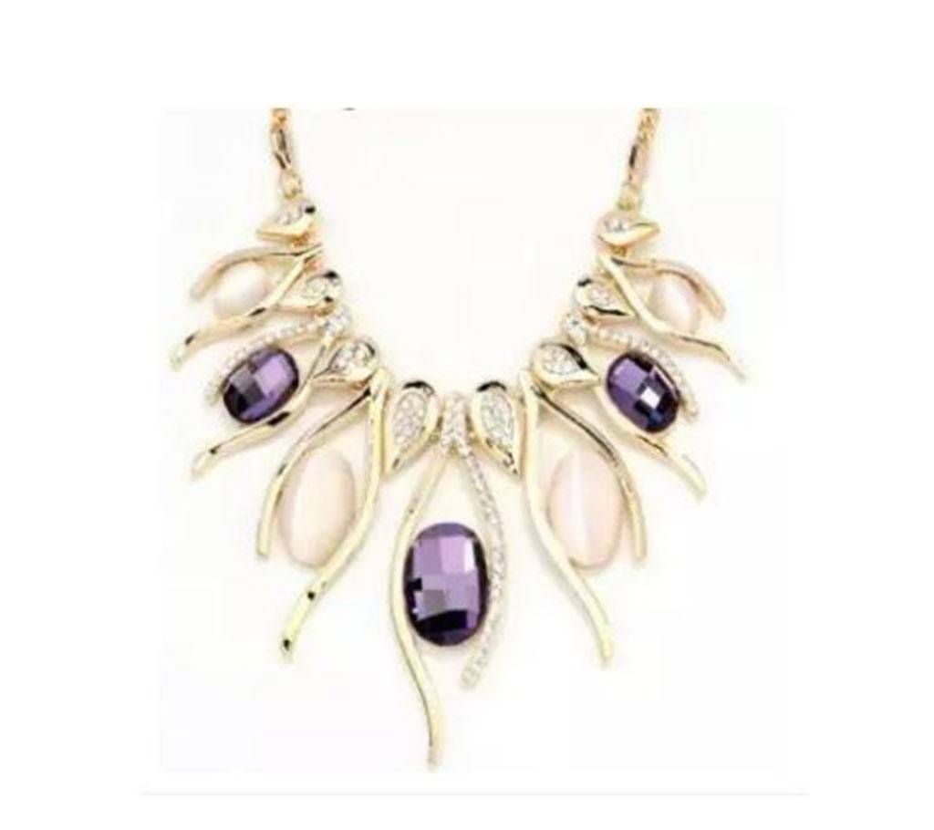 Gold Rose Dancing Wave Necklace with Purple and white stone.
