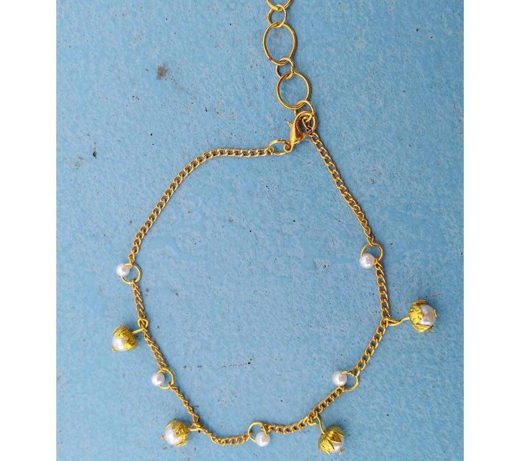 pearl and golden chain bracelet 