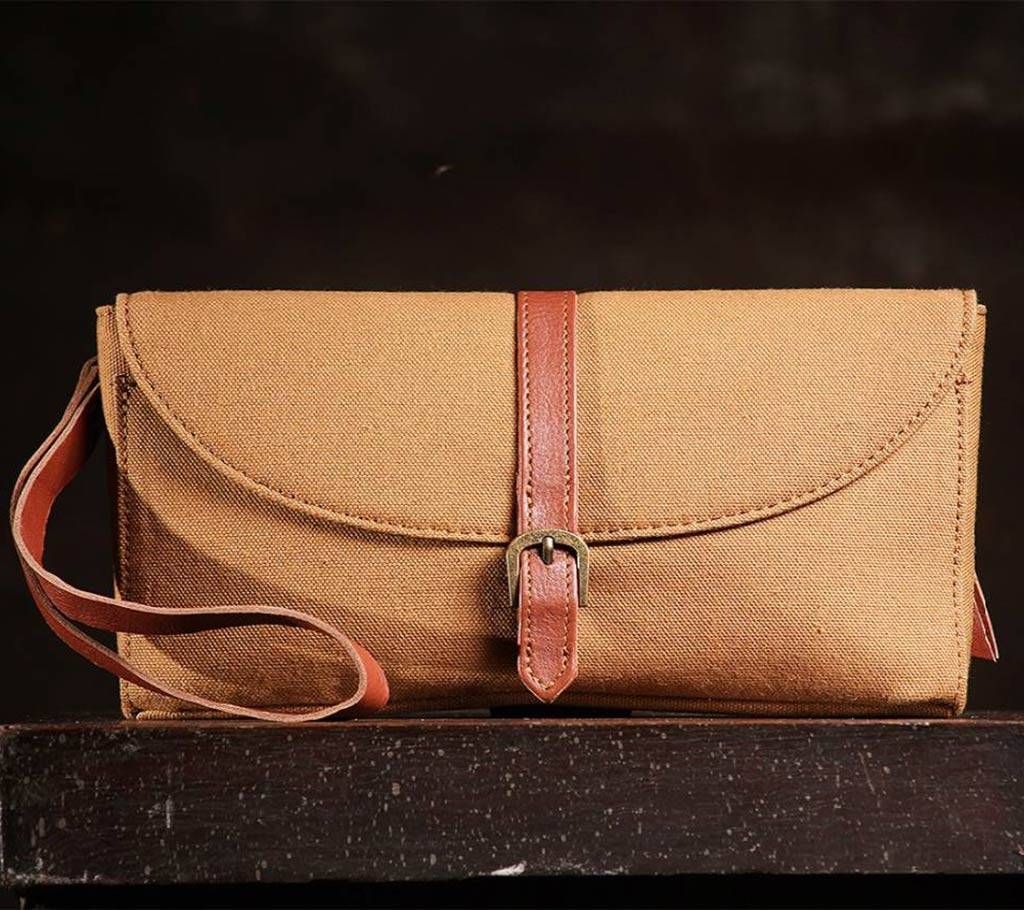 Maria- mustard hand purse