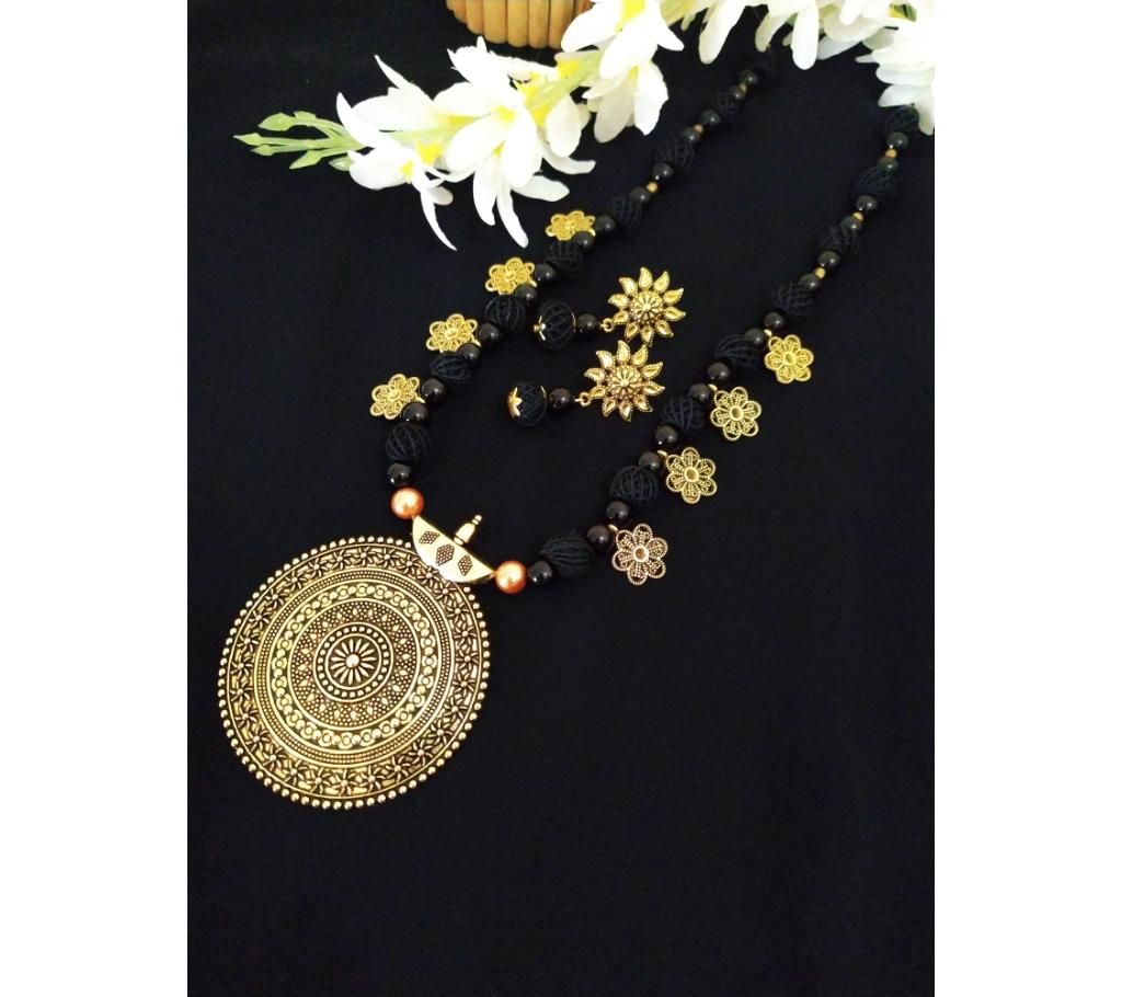 Copper Locket with a pair of earring