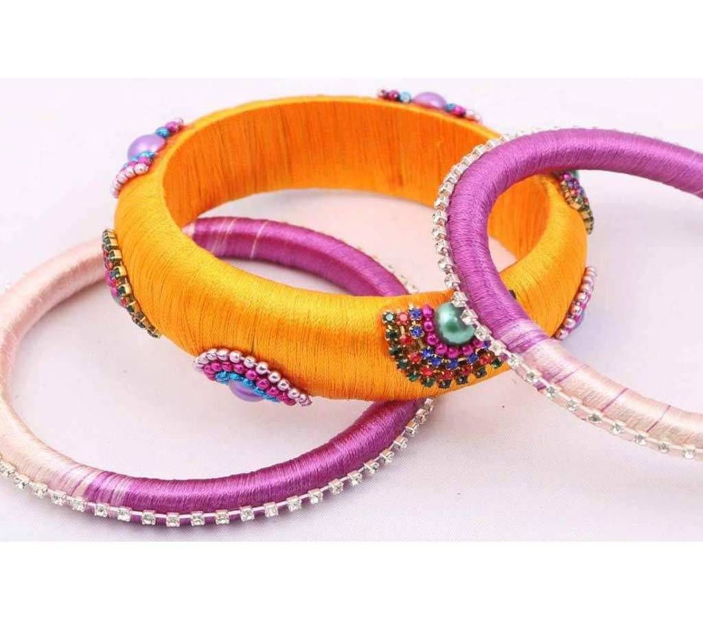 Yellow color silk thread bangles set