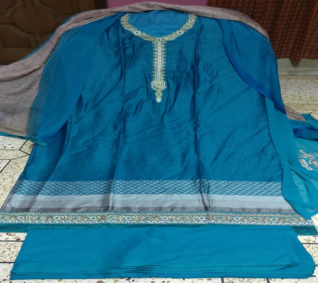 Unstitched  Three Pcs