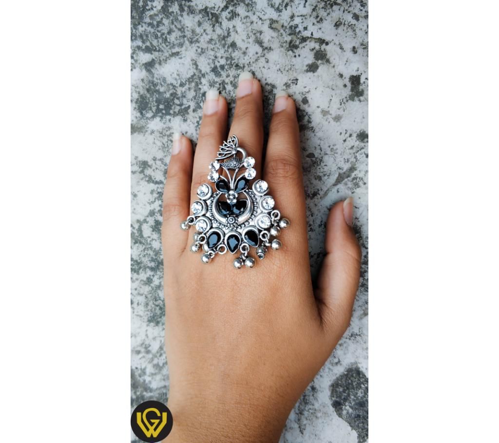 Peacock stone ring black