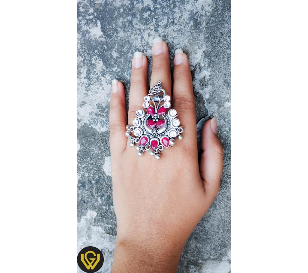Peacock stone ring red