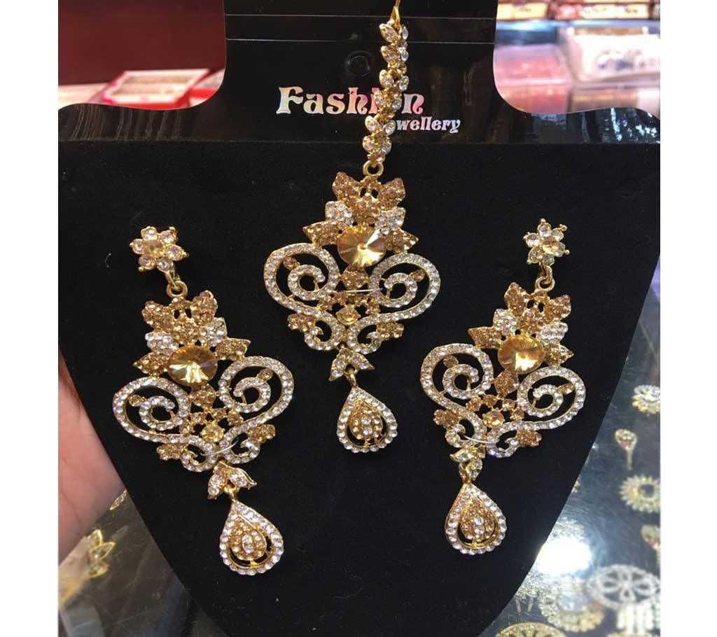Indian earrings and tikly
