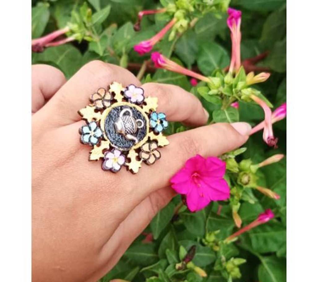 Floral teapot finger ring