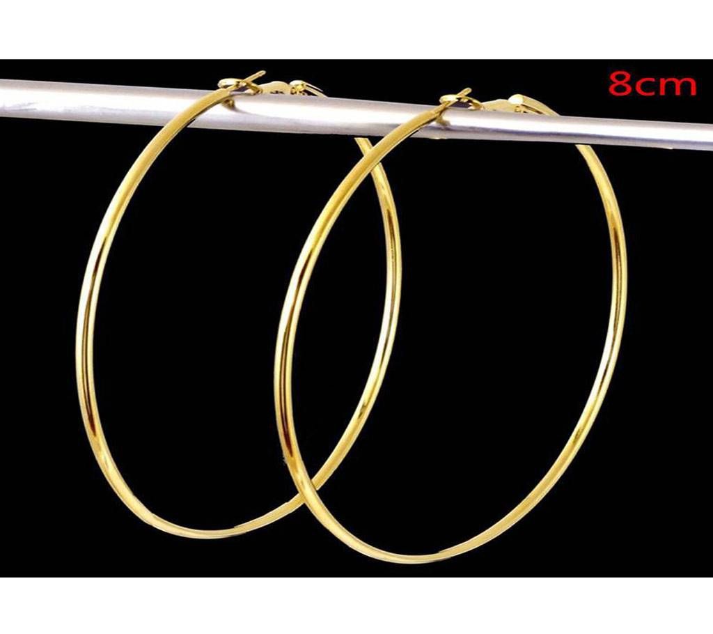 Golden round earring